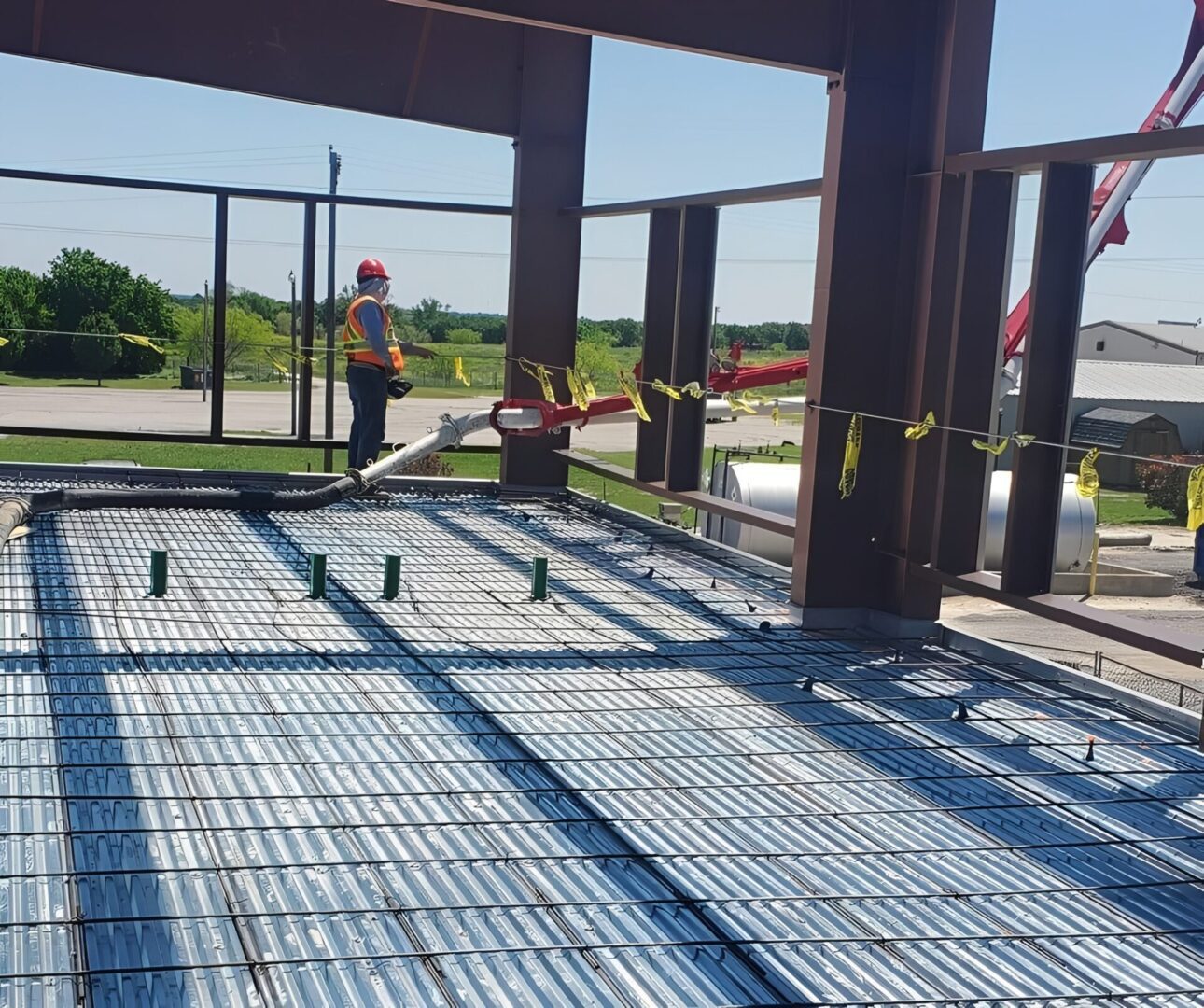 Construction worker on steel framework